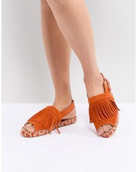 Оранжевые кожаные сандалии на плоской подошве с украшением