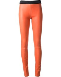 Оранжевые кожаные узкие брюки от Drome