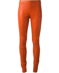 Оранжевые кожаные узкие брюки от Joseph