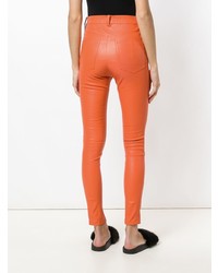 Оранжевые кожаные узкие брюки от Manokhi