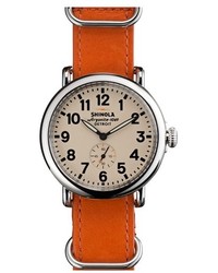 Оранжевые кожаные часы