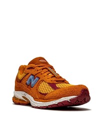 Мужские оранжевые кроссовки от New Balance