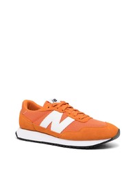 Мужские оранжевые кроссовки от New Balance