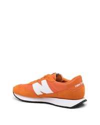 Мужские оранжевые кроссовки от New Balance