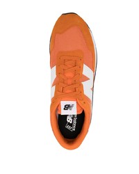 Мужские оранжевые кроссовки от New Balance