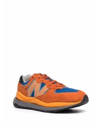 Мужские оранжевые кроссовки от New Balance