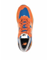 Мужские оранжевые кроссовки от New Balance