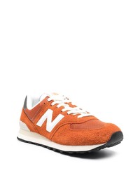 Мужские оранжевые кроссовки от New Balance