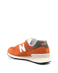 Мужские оранжевые кроссовки от New Balance