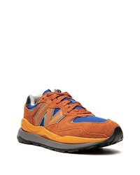 Мужские оранжевые кроссовки от New Balance