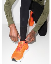 Мужские оранжевые кроссовки от Hoka One One