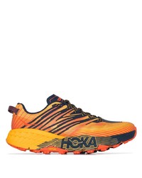 Мужские оранжевые кроссовки от Hoka One One