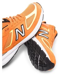 Мужские оранжевые кроссовки от New Balance