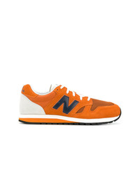 Мужские оранжевые кроссовки от New Balance