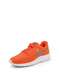 Женские оранжевые кроссовки от Nike