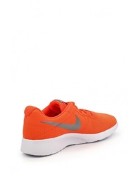 Женские оранжевые кроссовки от Nike