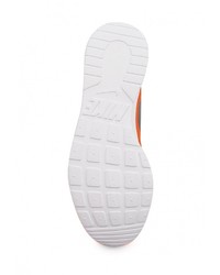 Женские оранжевые кроссовки от Nike