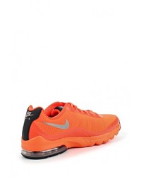 Женские оранжевые кроссовки от Nike