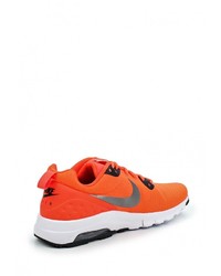Женские оранжевые кроссовки от Nike