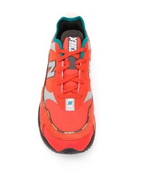 Мужские оранжевые кроссовки от New Balance