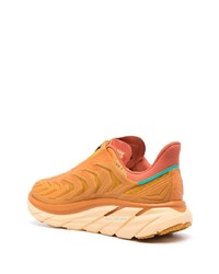 Мужские оранжевые кроссовки от Hoka One One