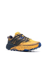Мужские оранжевые кроссовки от Hoka One One