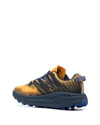 Мужские оранжевые кроссовки от Hoka One One