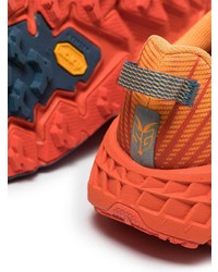 Мужские оранжевые кроссовки от Hoka One One