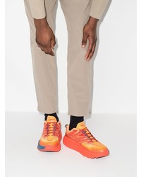 Мужские оранжевые кроссовки от Hoka One One