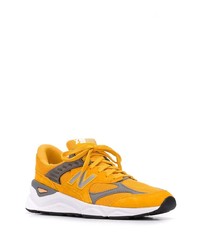 Мужские оранжевые кроссовки от New Balance