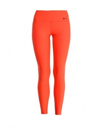 Оранжевые леггинсы от Nike