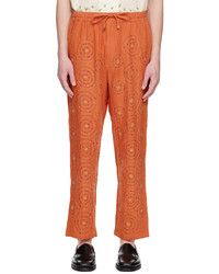 Оранжевые льняные брюки чинос с вышивкой