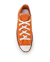 Мужские оранжевые низкие кеды из плотной ткани от Converse