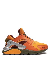 Мужские оранжевые низкие кеды из плотной ткани от Nike
