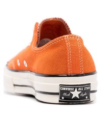 Мужские оранжевые низкие кеды от Converse