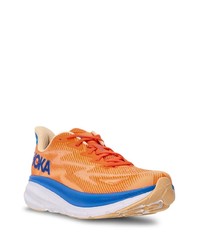 Мужские оранжевые низкие кеды от Hoka One One