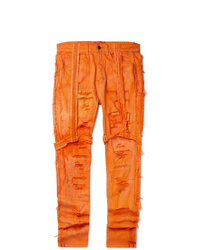 Мужские оранжевые рваные зауженные джинсы от EV BRAVADO