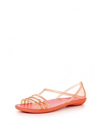 Оранжевые сандалии на плоской подошве от Crocs