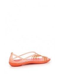 Оранжевые сандалии на плоской подошве от Crocs