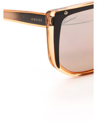 Женские оранжевые солнцезащитные очки от Gucci