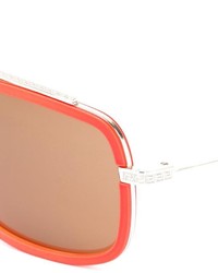 Женские оранжевые солнцезащитные очки от Versace
