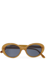 Женские оранжевые солнцезащитные очки от Oliver Peoples