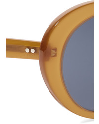 Женские оранжевые солнцезащитные очки от Oliver Peoples