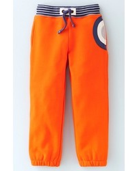 Оранжевые спортивные штаны