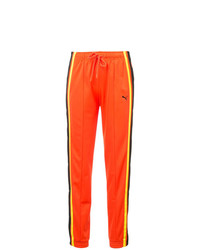 Женские оранжевые спортивные штаны от Fenty X Puma