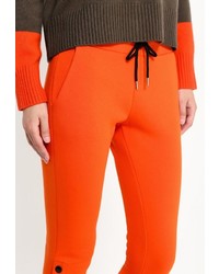 Женские оранжевые спортивные штаны от Iceberg