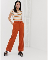 Женские оранжевые спортивные штаны от Monki