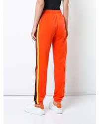 Женские оранжевые спортивные штаны от Fenty X Puma