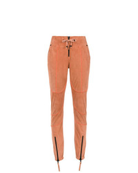 Оранжевые узкие брюки от Andrea Bogosian