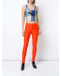 Оранжевые узкие брюки от Fenty X Puma